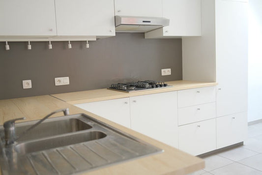 How to Paint Laminate Kitchen Cabinets Without Sanding
