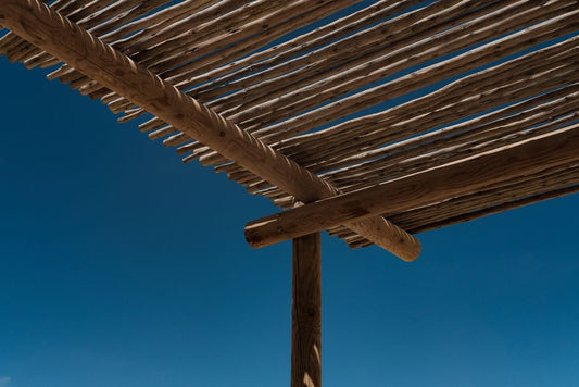 How to Build a Freestanding Pergola Without Calling a Plumber