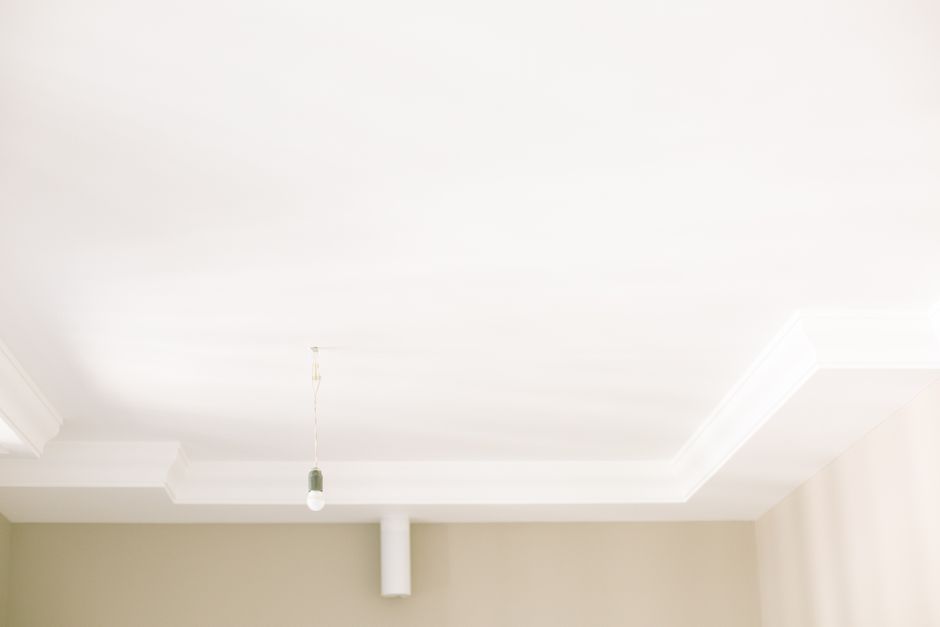 How to Transform a Rental Living Room with Peel-and-Stick Wallpaper and Temporary Crown Molding