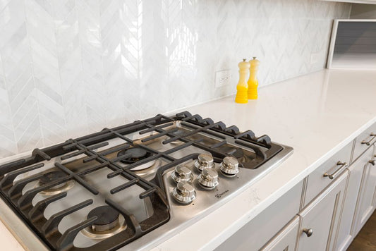 How to Deep Clean a Kitchen Oven and Stove Top Without Harsh Chemicals