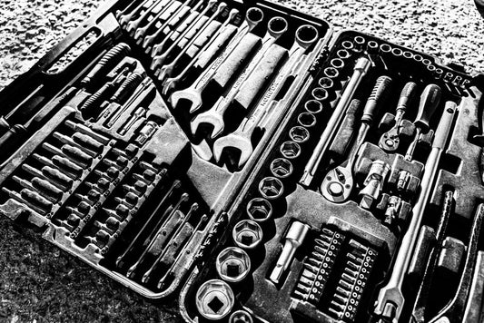 The Airport Tool Kit Everyone Forgets: Why Your Checked Bag Needs a Car Maintenance Kit